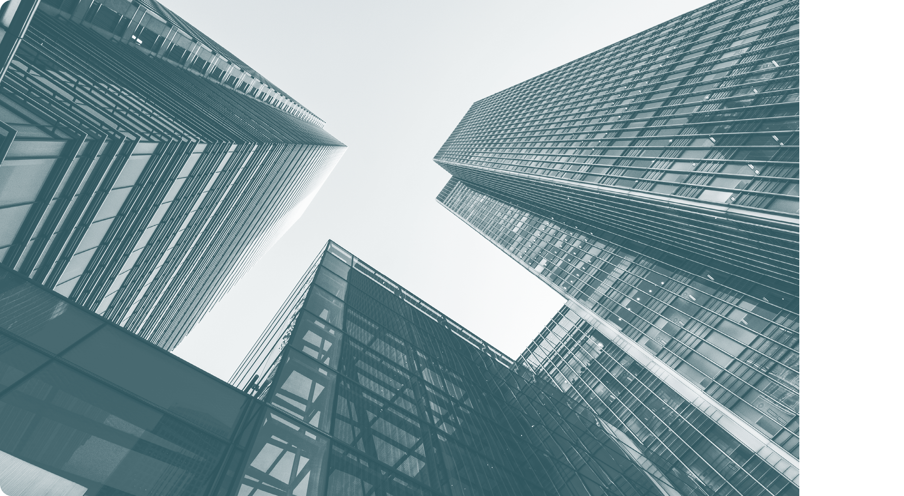 London, UK - 13 May 2015: A low and wide angle view of converging skyscrapers in the business and financial district of London Docklands.