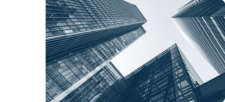 London, UK - 13 May 2015: A low and wide angle view of converging skyscrapers in the business and financial district of London Docklands.